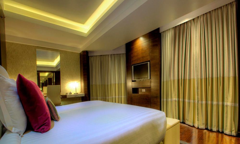 Avari Towers การาจี ภายนอก รูปภาพ A bedroom at the Taj Bengal
